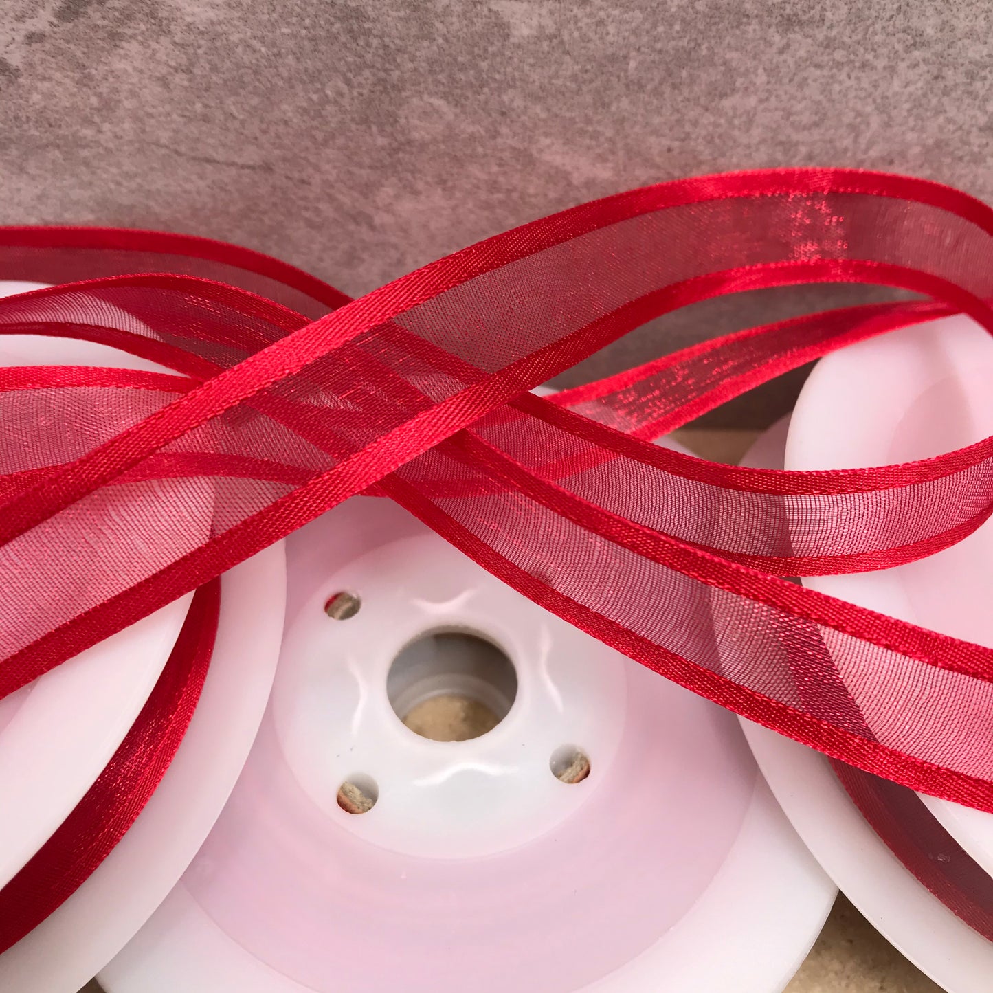 Lovely red sheer ribbon, beautifully enhances any gift